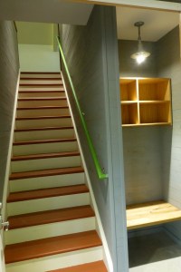 Enter from the back of the barn with private stairwell and vestibule for hats, coats, boots, etc. Opens on to patio and private parking.